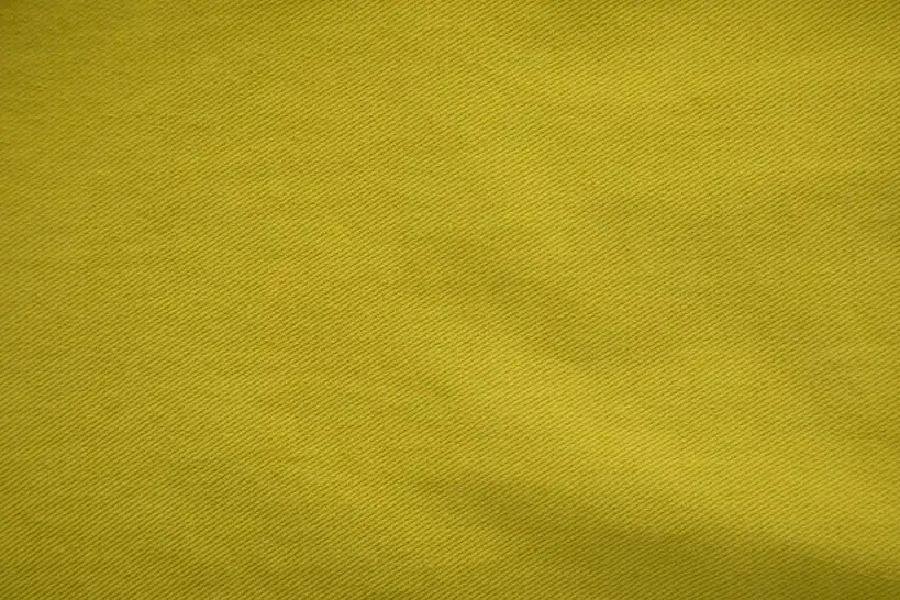 Mustársárga textil közelről